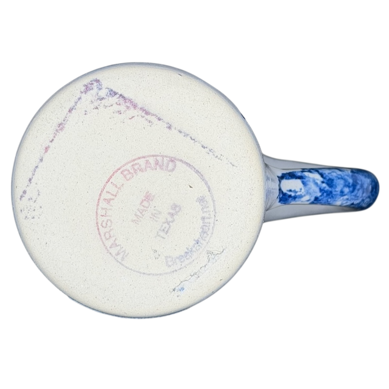 Bottom view of Texas Bluebonnet Pottery Mug Marshall Brand showcasing unique glaze and crafting details