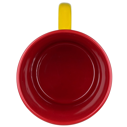 Top view of a red mug with a yellow handle featuring a Mickey Mouse Disneyland graphic font mug design
