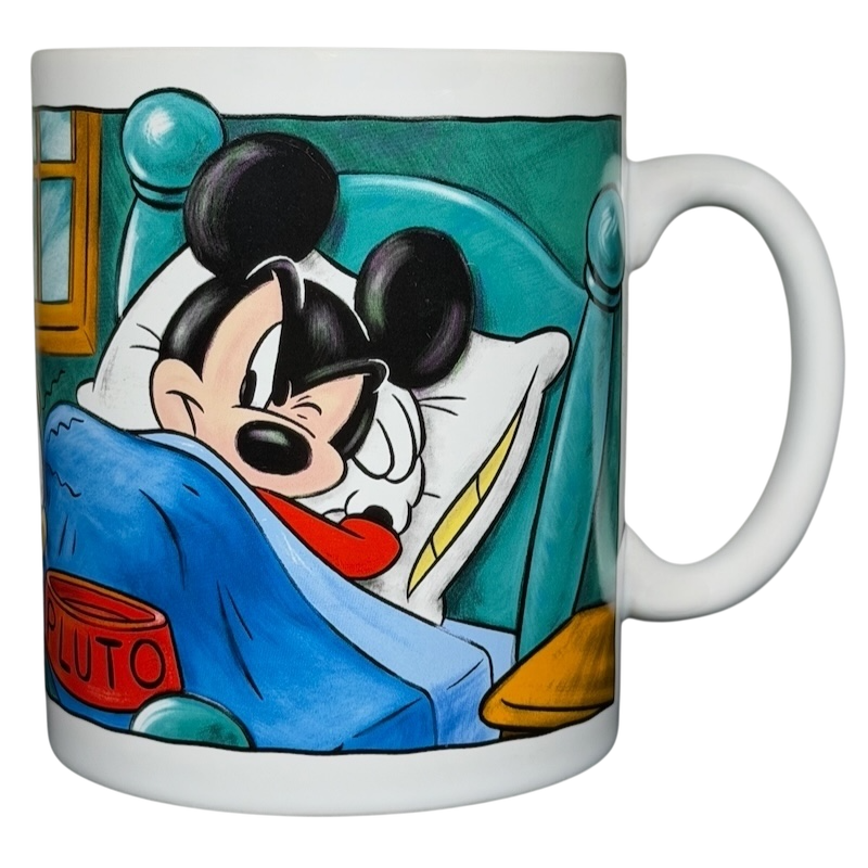 Disney Mickey Mouse & Pluto Mornings coffee mug featuring Mickey in bed with Pluto's dog bowl