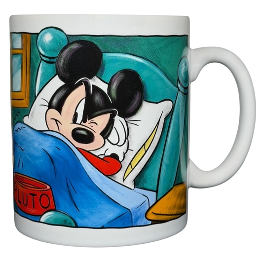 Disney Mickey Mouse & Pluto Mornings coffee mug featuring Mickey in bed with Pluto's dog bowl