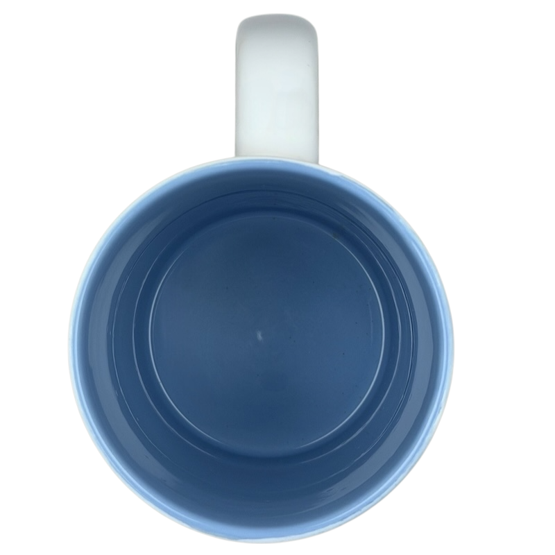 Top view of a blue ceramic mug featuring Mickey Mouse waffle Rise and Shine design for Disney fans