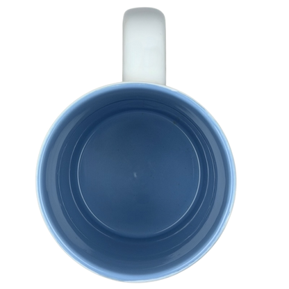 Top view of a blue ceramic mug featuring Mickey Mouse waffle Rise and Shine design for Disney fans