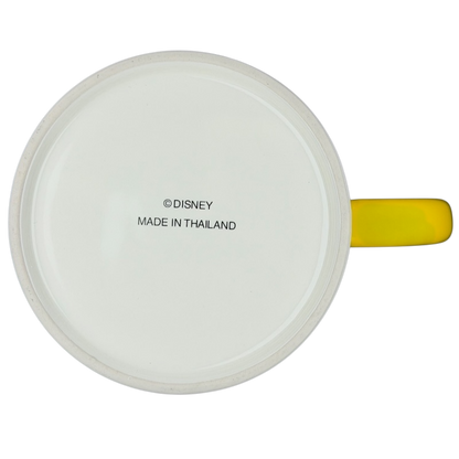 Bottom view of a Minnie Mouse Disneyland graphic font mug with a yellow handle, showcasing Disney branding