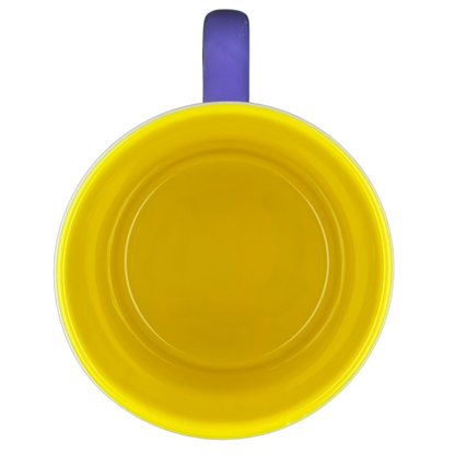 Bright yellow Minnie Mouse Disneyland graphic font mug with a purple handle for Disney fans