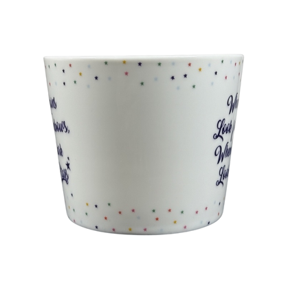 Cooksmart When It Rains Look For Rainbows mug white ceramic with multicolor star border and navy script inspirational quote