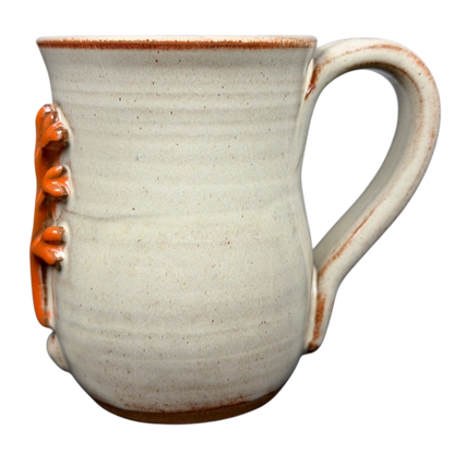 Coastal Seashell Coral Mug Mudworks featuring a textured coral design on a beige ceramic surface