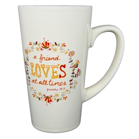 Natural Life A Friend Loves At All Times mug featuring a floral design and inspirational quote