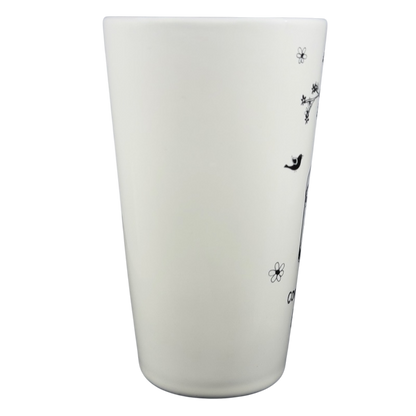 Natural Life Come Home For Love mug with floral and bird designs on a white background