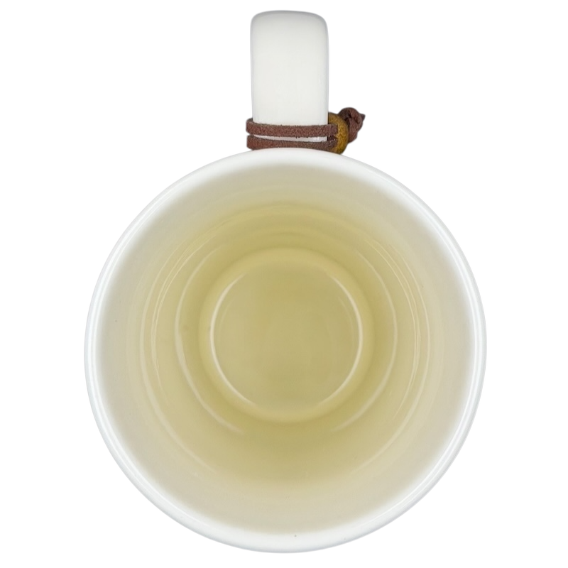 Inside view of Natural Life Come Home For Love mug showing a smooth, light-colored interior