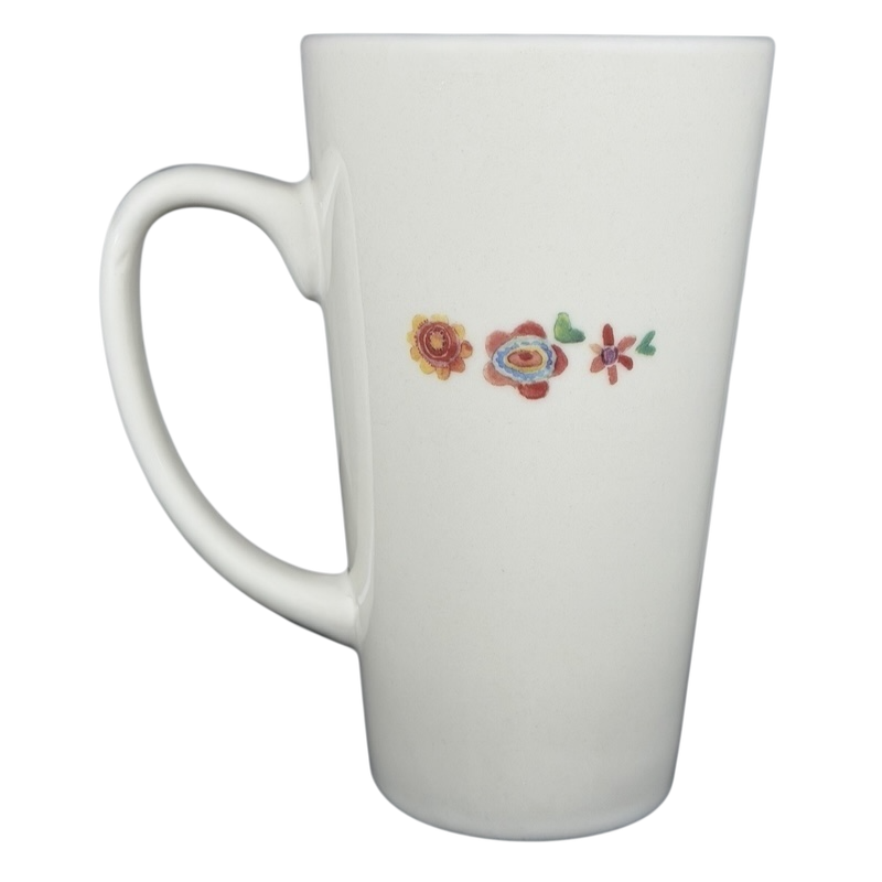Natural Life Dance as if no one were watching mug with colorful floral design and a sleek handle