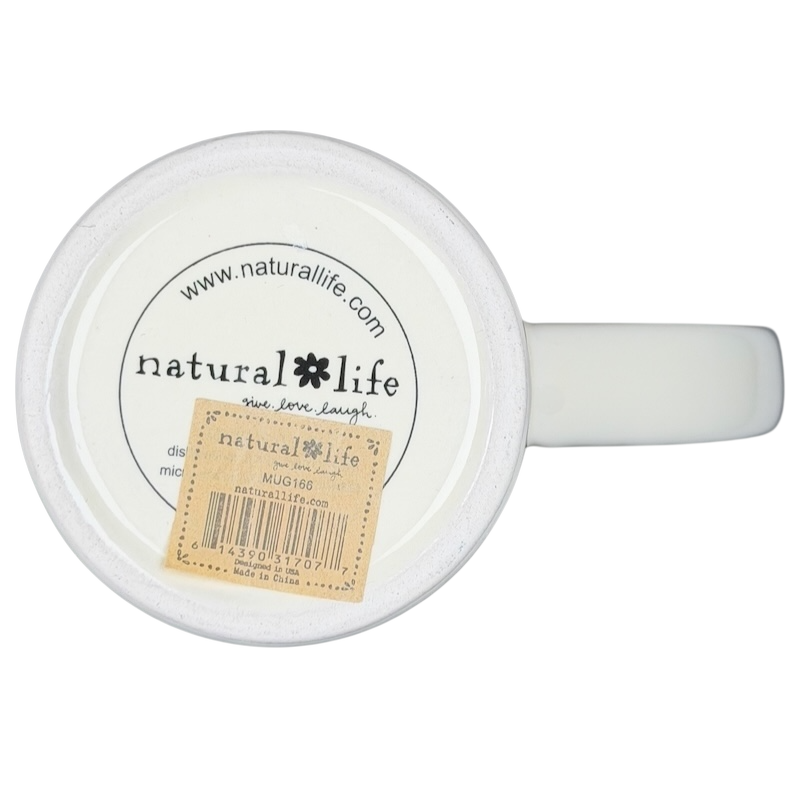 Bottom view of Natural Life Do More Of What Makes You Happy mug showing logo and tag details