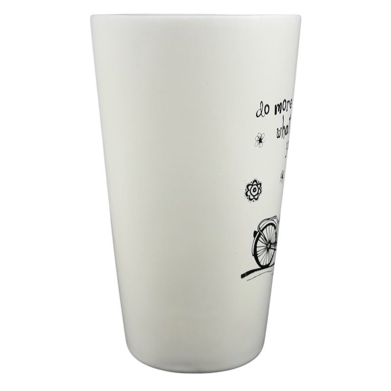 Natural Life Do More Of What Makes You Happy mug with cheerful design and bicycle illustration