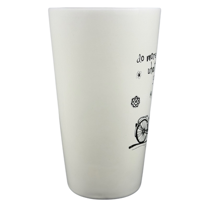 Natural Life Do More Of What Makes You Happy mug with cheerful design and bicycle illustration