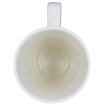 Top view of a white mug that reads Natural Life every home would have a dog mug