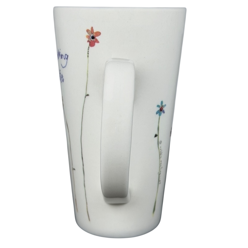 Natural Life Friends Are Angels mug with colorful flower designs and uplifting quote