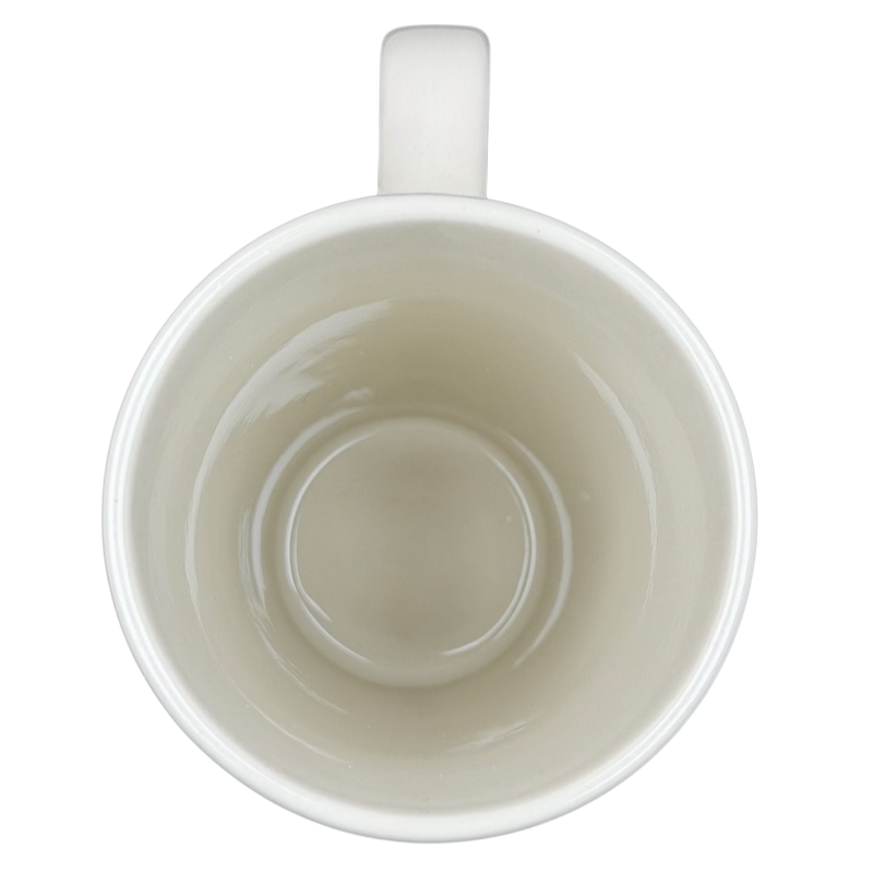 Interior view of Natural Life Friends Are Angels mug showing a smooth, simple design in white