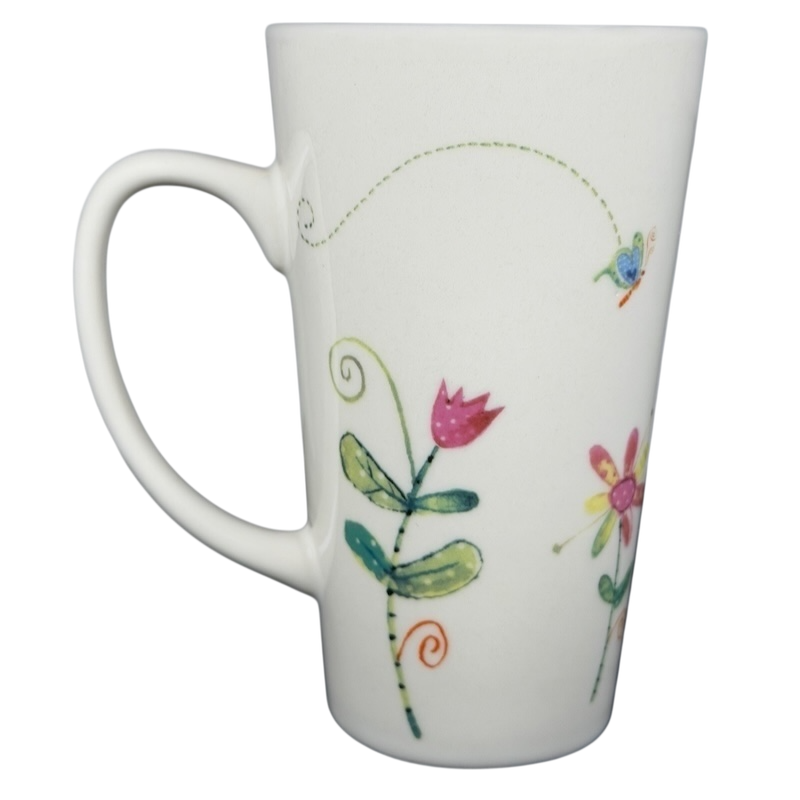 Natural Life Friends Are Like Flowers mug featuring colorful floral designs on a tall white ceramic mug