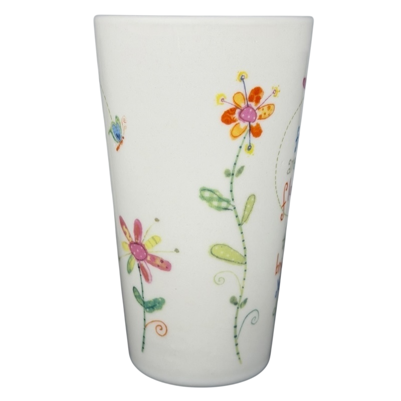 Natural Life Friends Are Like Flowers mug featuring colorful floral designs and whimsical patterns