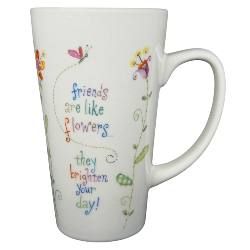 Natural Life Friends Are Like Flowers mug with colorful floral design and uplifting quote