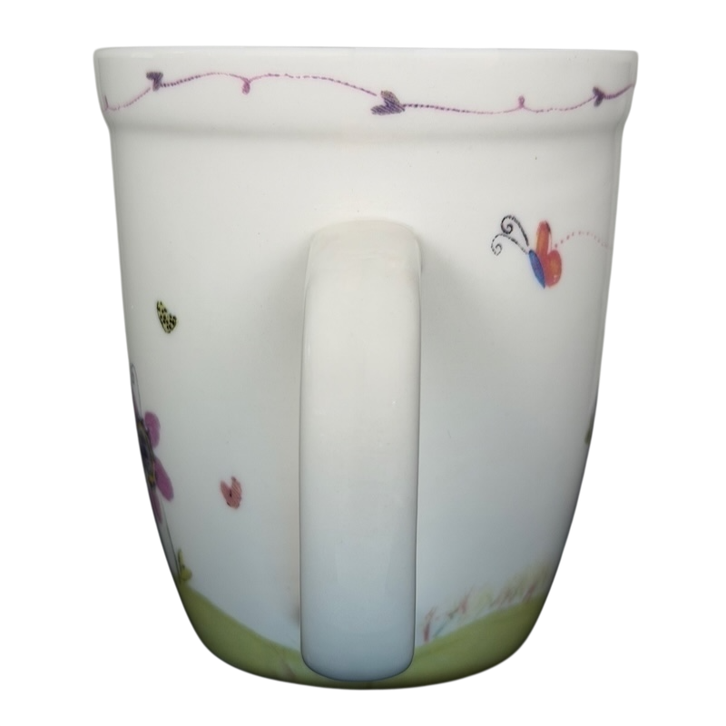 I Can Do All Things Through Christ Natural Life mug with colorful floral design and vibrant butterflies
