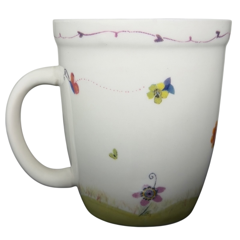 I Can Do All Things Through Christ Natural Life mug with colorful floral designs and uplifting messages