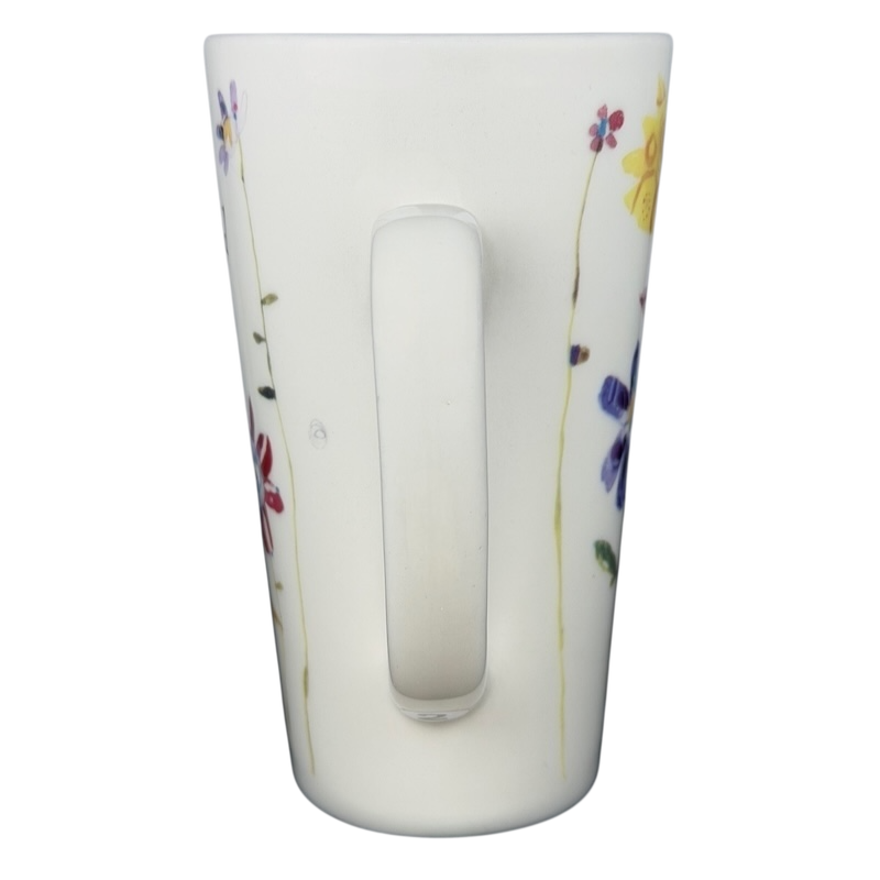 Natural Life Life is Good mug featuring colorful floral patterns and a comfortable handle