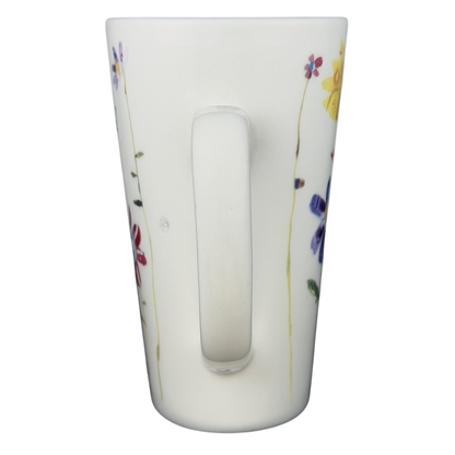 Natural Life Life is Good mug featuring colorful floral patterns and a comfortable handle