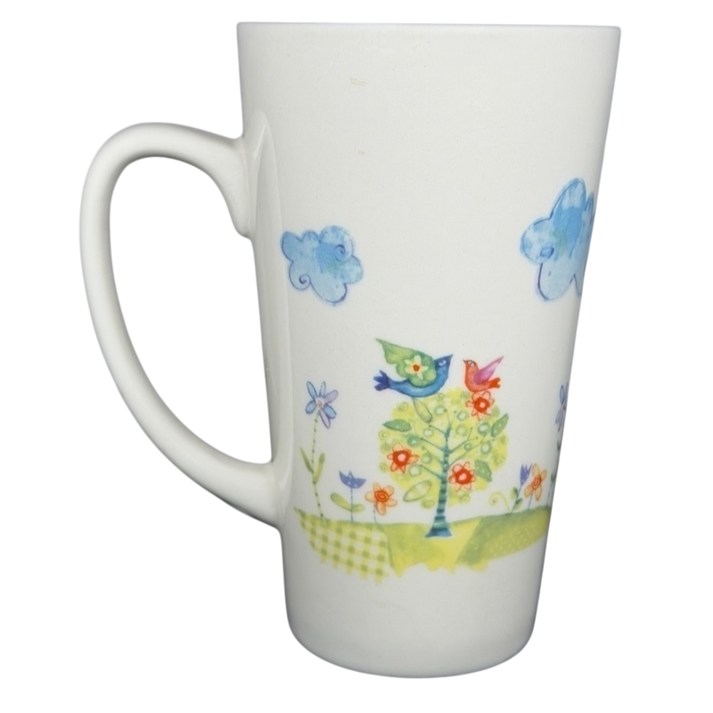 Natural Life mother is a friend mug featuring colorful birds and flowers on a whimsical design
