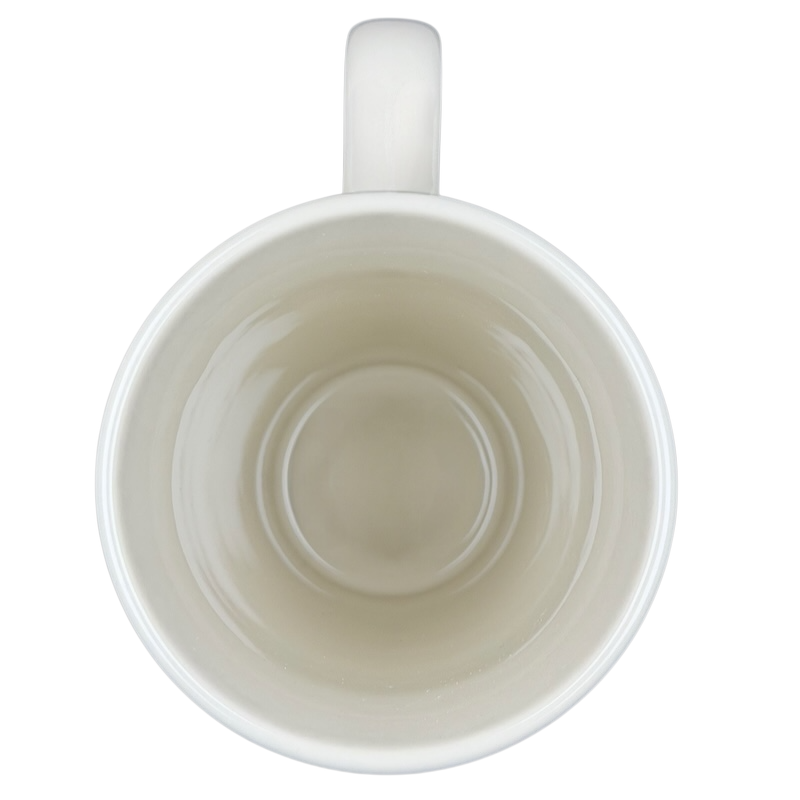 Top view of Natural Life mother is a friend mug featuring a smooth, white ceramic design