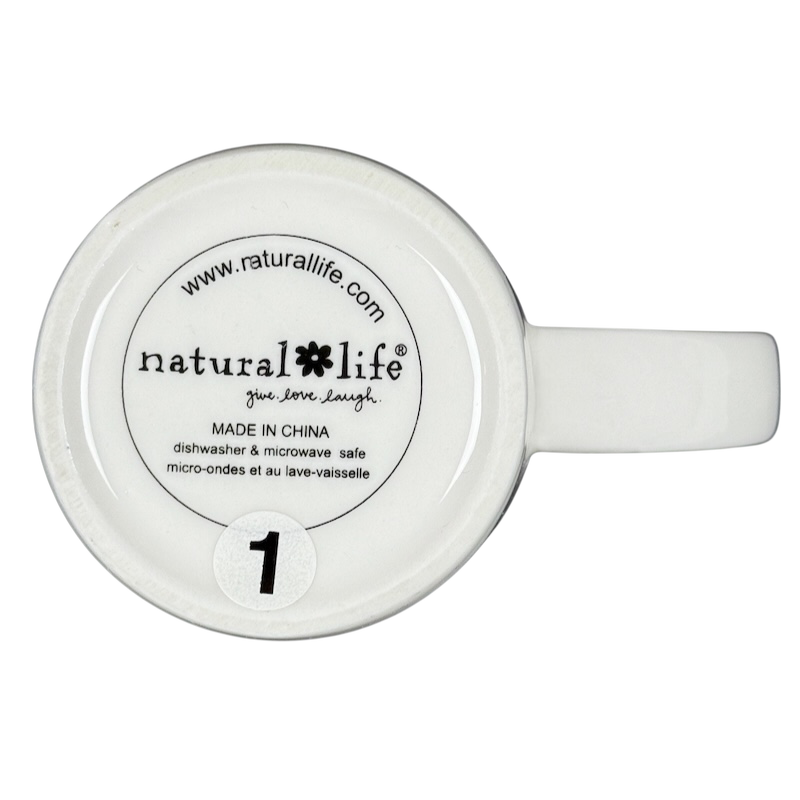 Bottom view of white ceramic mug with Natural Life logo and safety text featuring perfect world Natural Life cat mug