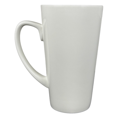 Tall white ceramic mug with curved handle on black background perfect world Natural Life cat mug