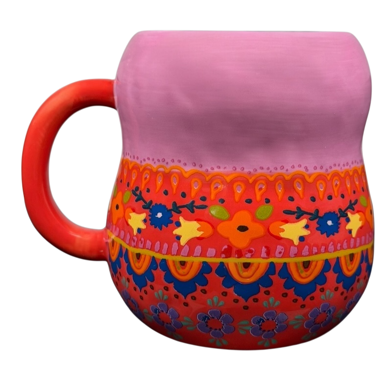 Colorful Russian Matryoshka Nesting Doll Mug Natural Life with floral designs and a vibrant handle