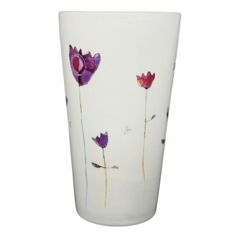 Natural Life Sisters Are Friends Forever mug with colorful floral design on a white background