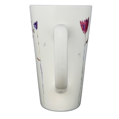 Natural Life Sisters Are Friends Forever mug with floral design and colorful flowers on a white background