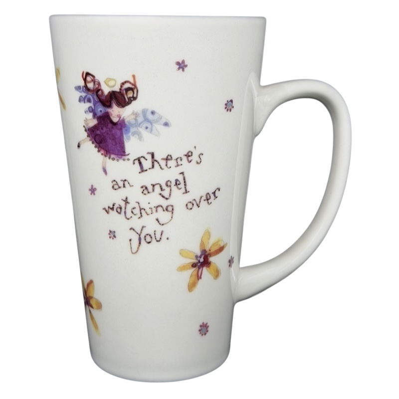 Natural Life There's an Angel Watching Over You mug featuring a whimsical design with flowers and a fairy