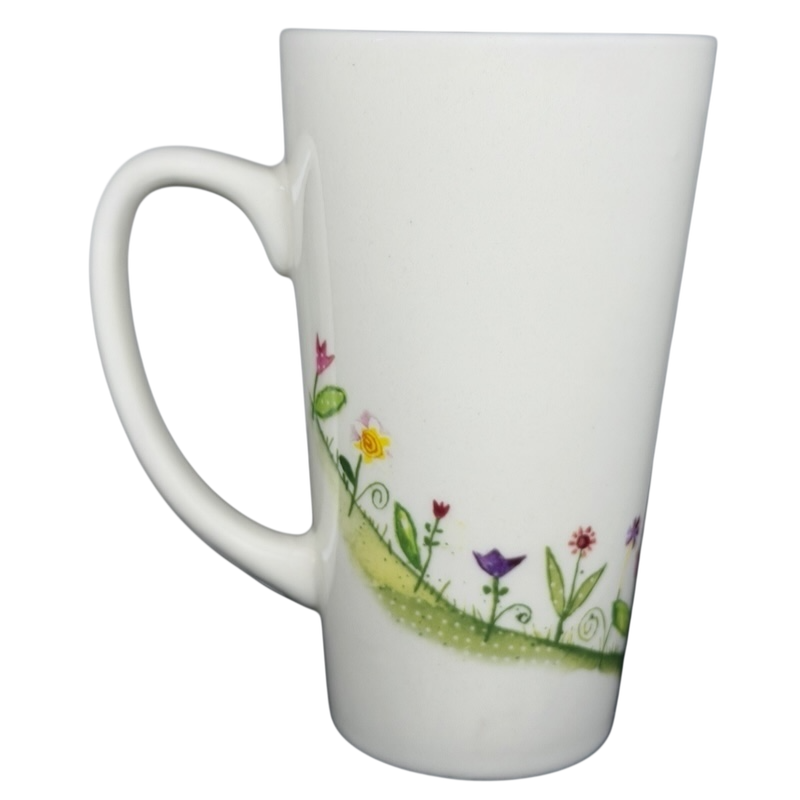 Natural Life When I Count My Blessings mug featuring a colorful floral design on a white background
