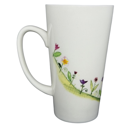 Natural Life When I Count My Blessings mug with colorful flower designs on a white background