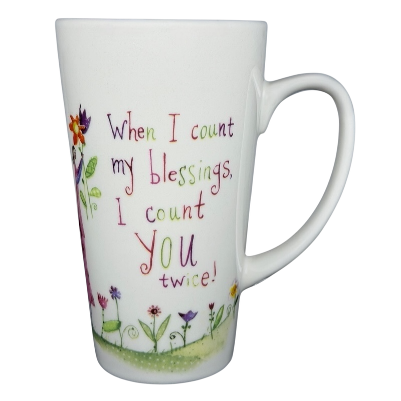 Natural Life When I Count My Blessings mug with colorful floral design and heartfelt message