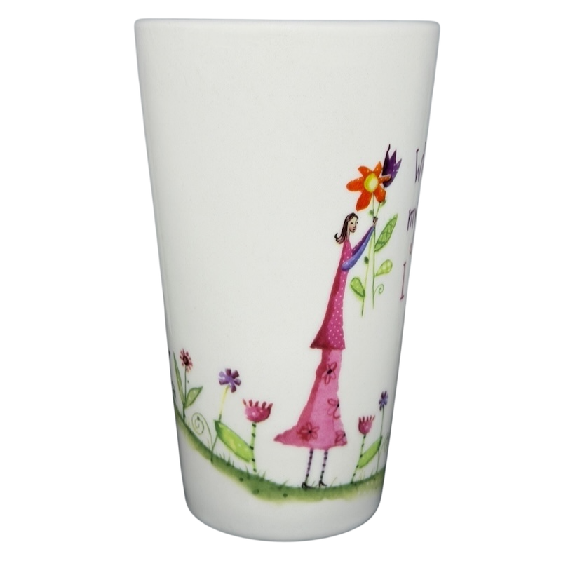 Natural Life When I Count My Blessings mug featuring a woman holding flowers in a colorful design