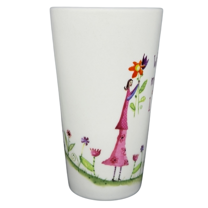 Natural Life When I Count My Blessings mug featuring a woman holding flowers in a colorful design