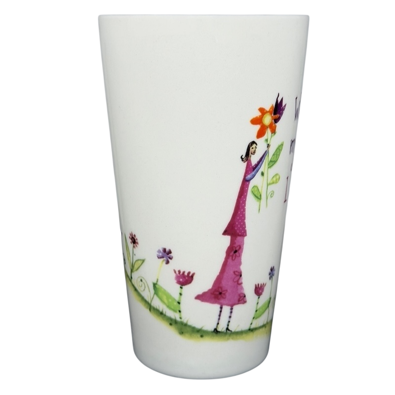 Natural Life When I Count My Blessings mug featuring colorful floral design and a girl holding a flower