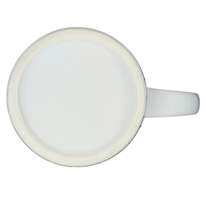 Top view of a white mug featuring New Orleans skyline piano notes design for music lovers