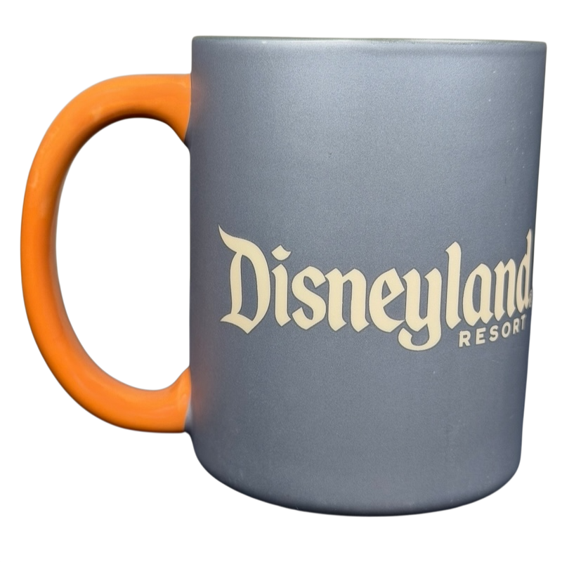 Oswald The Lucky Rabbit Disneyland Resort Mug with a vibrant orange handle and a smooth gray finish