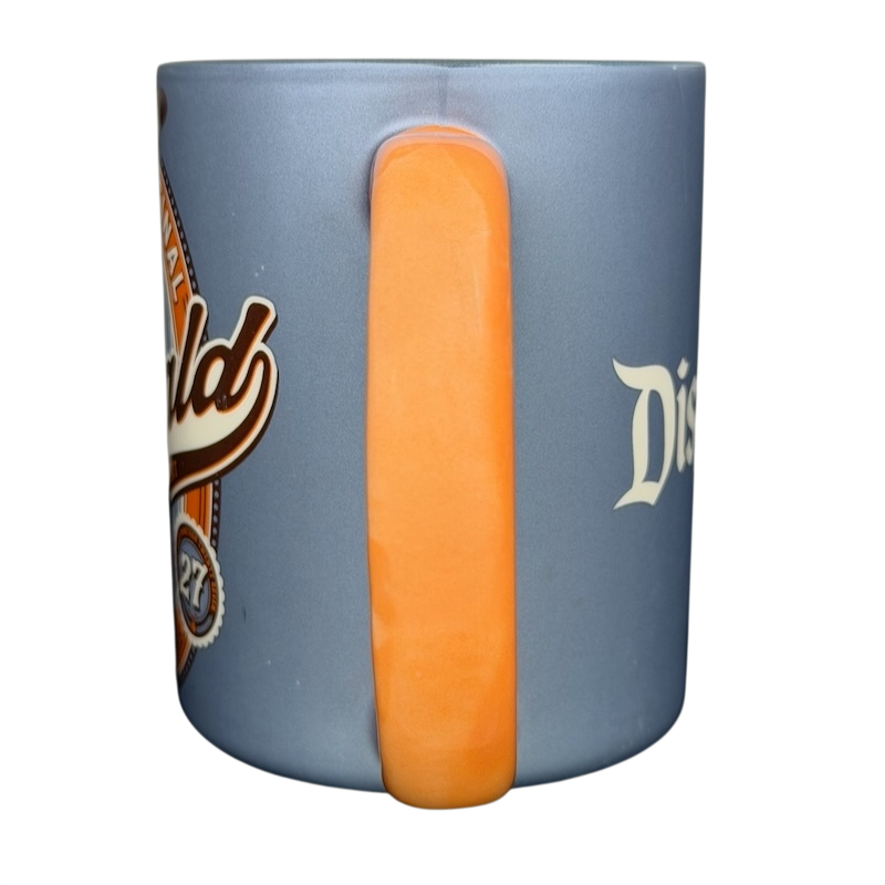 Oswald The Lucky Rabbit Disneyland Resort Mug with vibrant blue design and orange handle