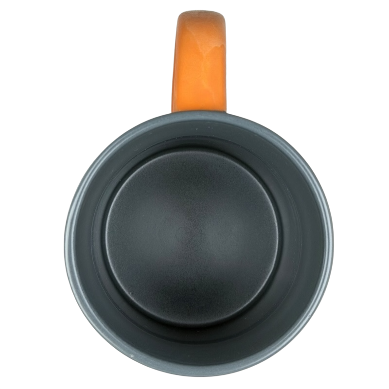 Top view of an orange-handled mug featuring Oswald The Lucky Rabbit Disneyland Resort Mug design