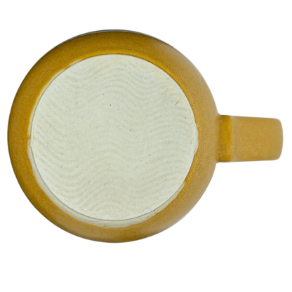 Bottom view of Otagiri butterflies tankard vintage mug showcasing its smooth ceramic finish