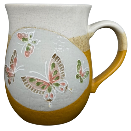 Otagiri butterflies tankard vintage mug with colorful butterfly design and textured finish.