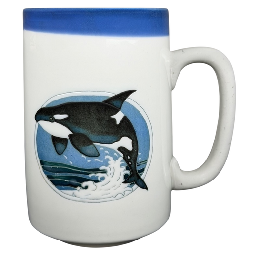 Otagiri orca vintage mug featuring an orca leaping over ocean waves in vibrant colors