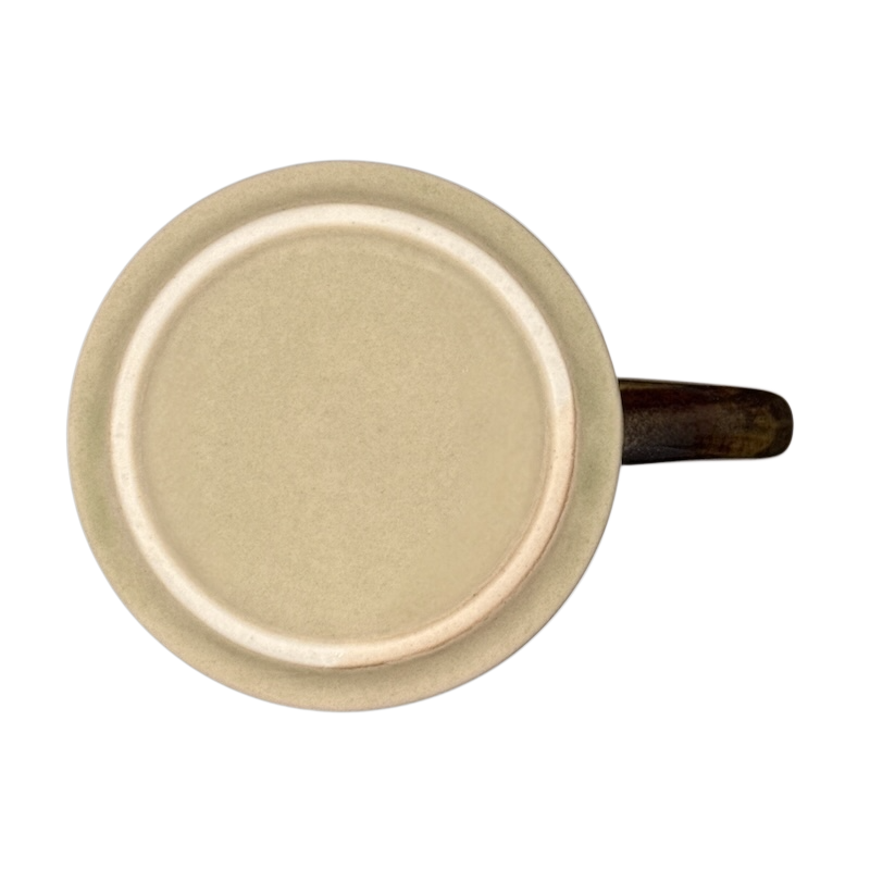Otagiri vintage white tailed deer mug top view showing beige interior and brown handle on black background