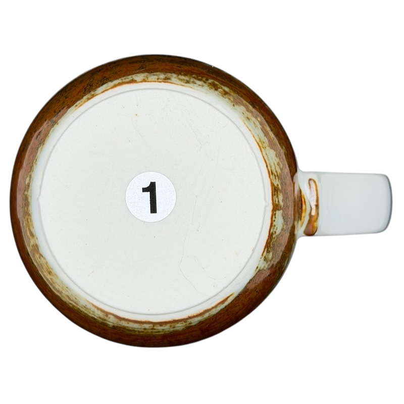Bottom view of Otagiri pheasants tankard vintage mug showing its unique handcrafted design